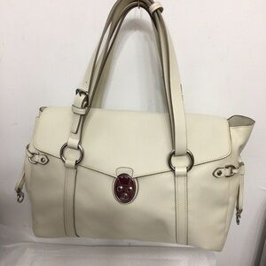 Tumi Elegant Cream Handbag. Brand new without Tag